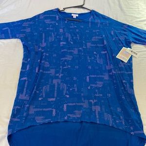 LuLaRoe woman’s blue with purple geometric lines Irma tunic size small NWT